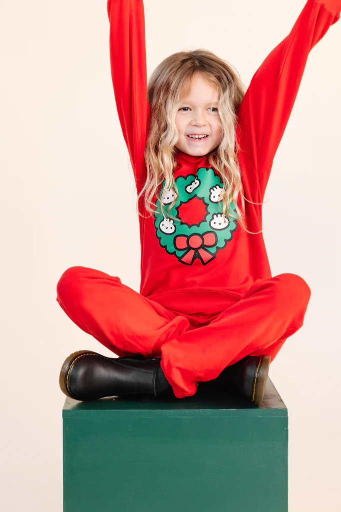 red printed sweatshirt worn by girl